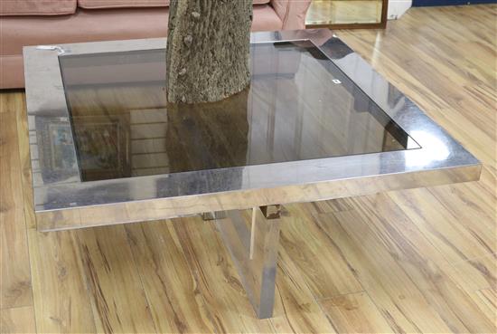 A stainless steel and Perspex coffee table, W.120cm